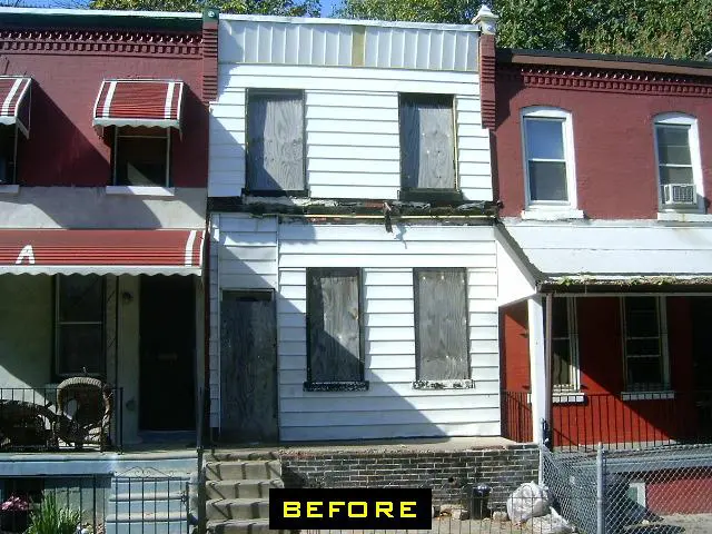 A house that is being renovated and has been painted.