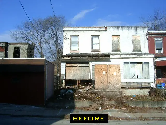 A building that is being demolished and the house has been torn down.